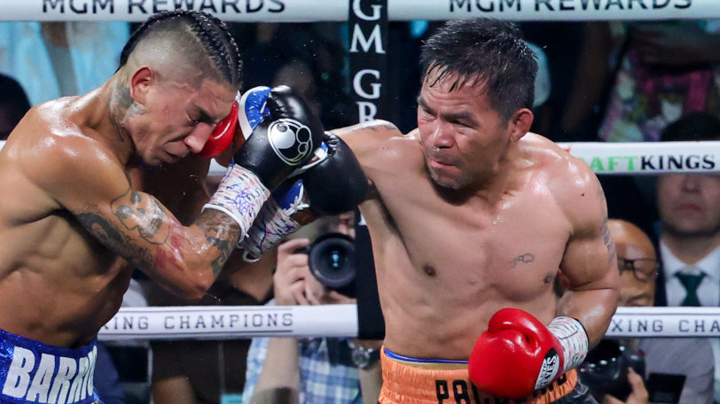 バリオスを攻めるパッキャオ,Ⓒゲッティイメージズ